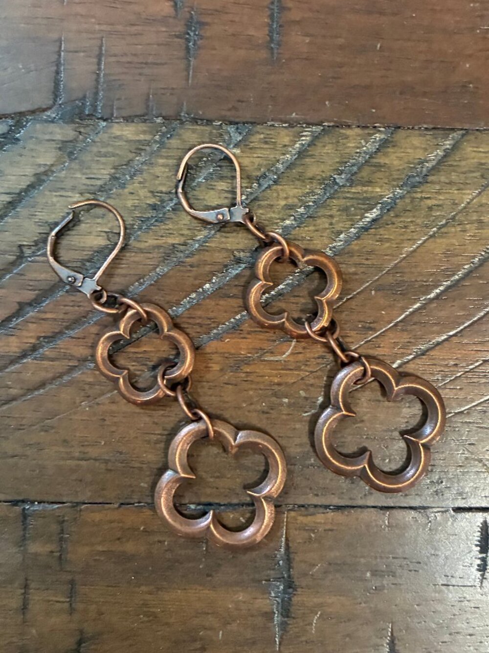 Antique artisan bohemian-style copper-plated quatrefoil dangle earrings
